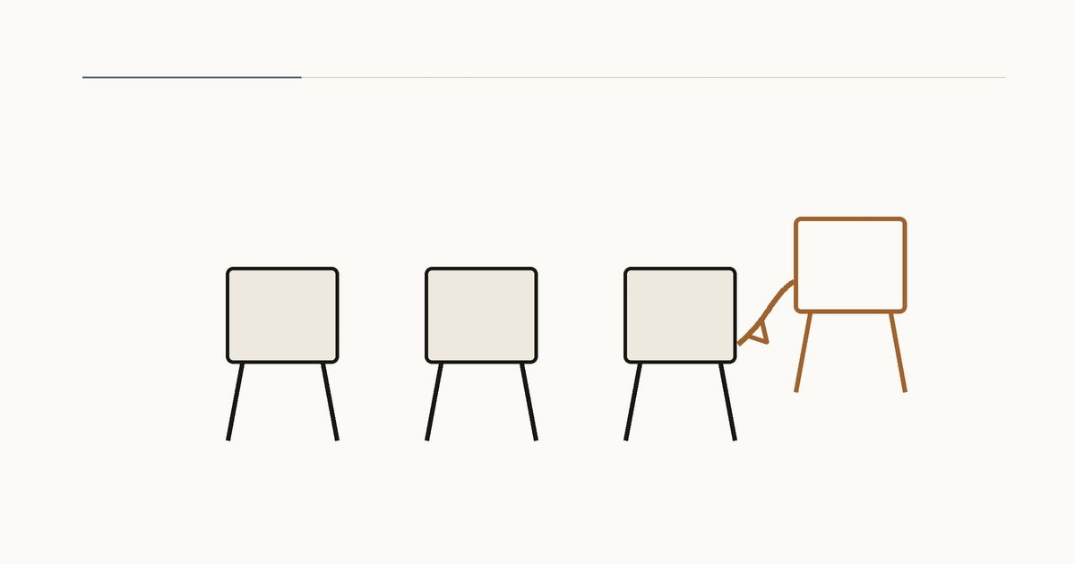 Three empty chairs wait while a fourth copper chair is pulled toward the group.